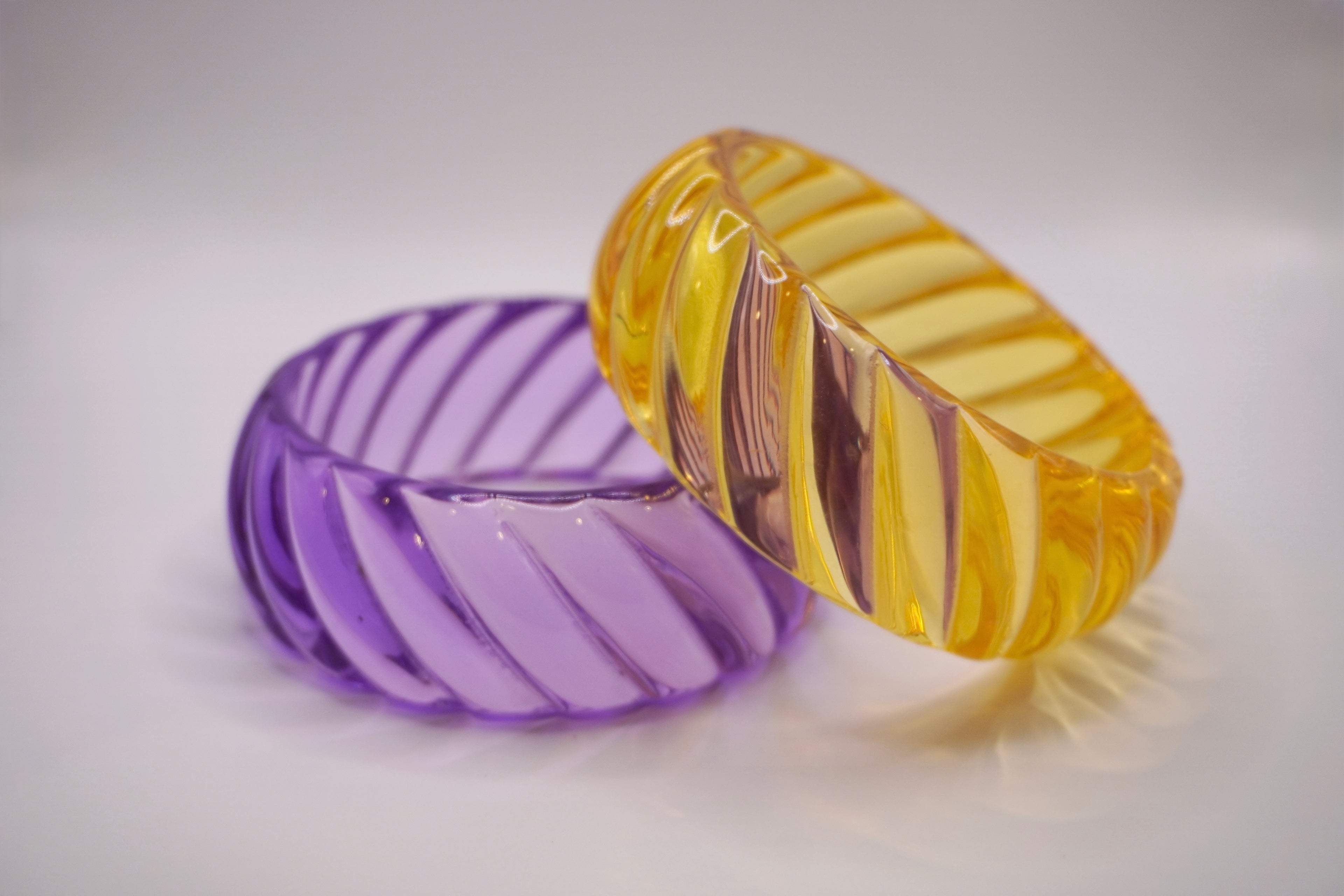 Twist bangles (purple/yellow)