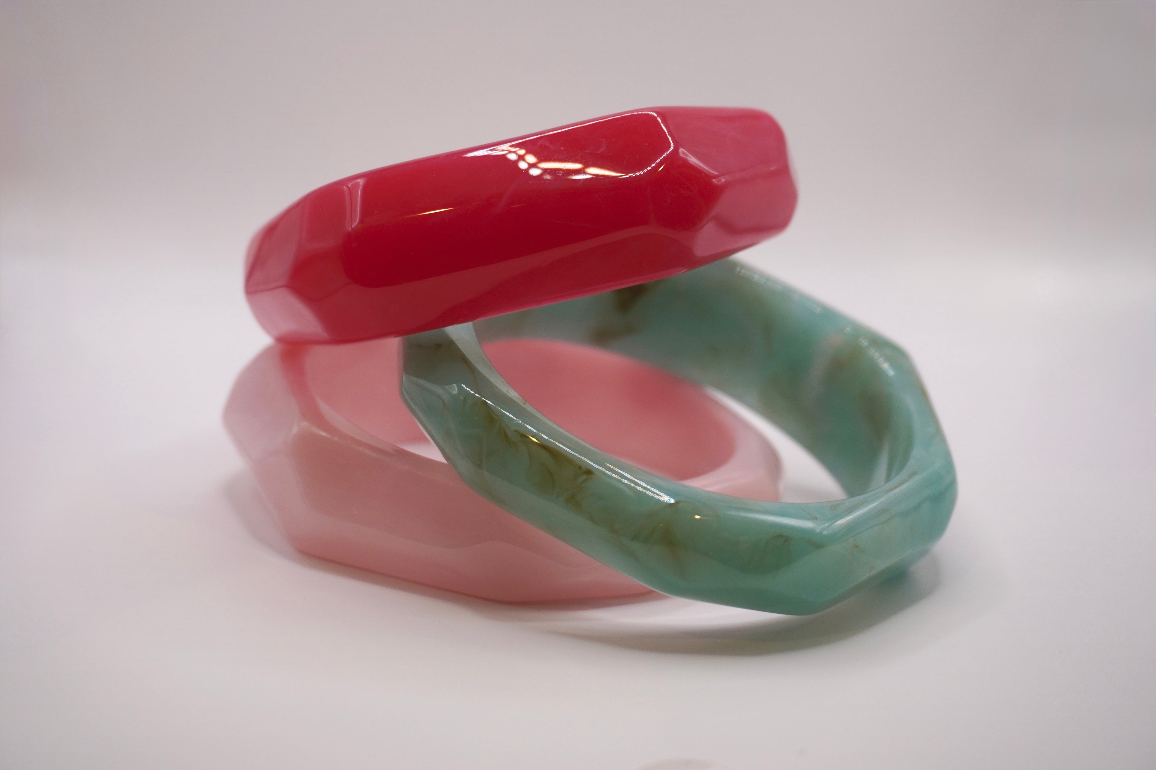 Geometric bangles (pink/green)