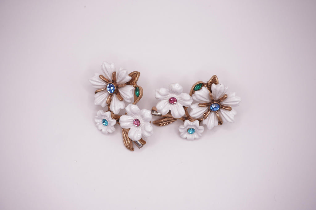 White enamel floral studs
