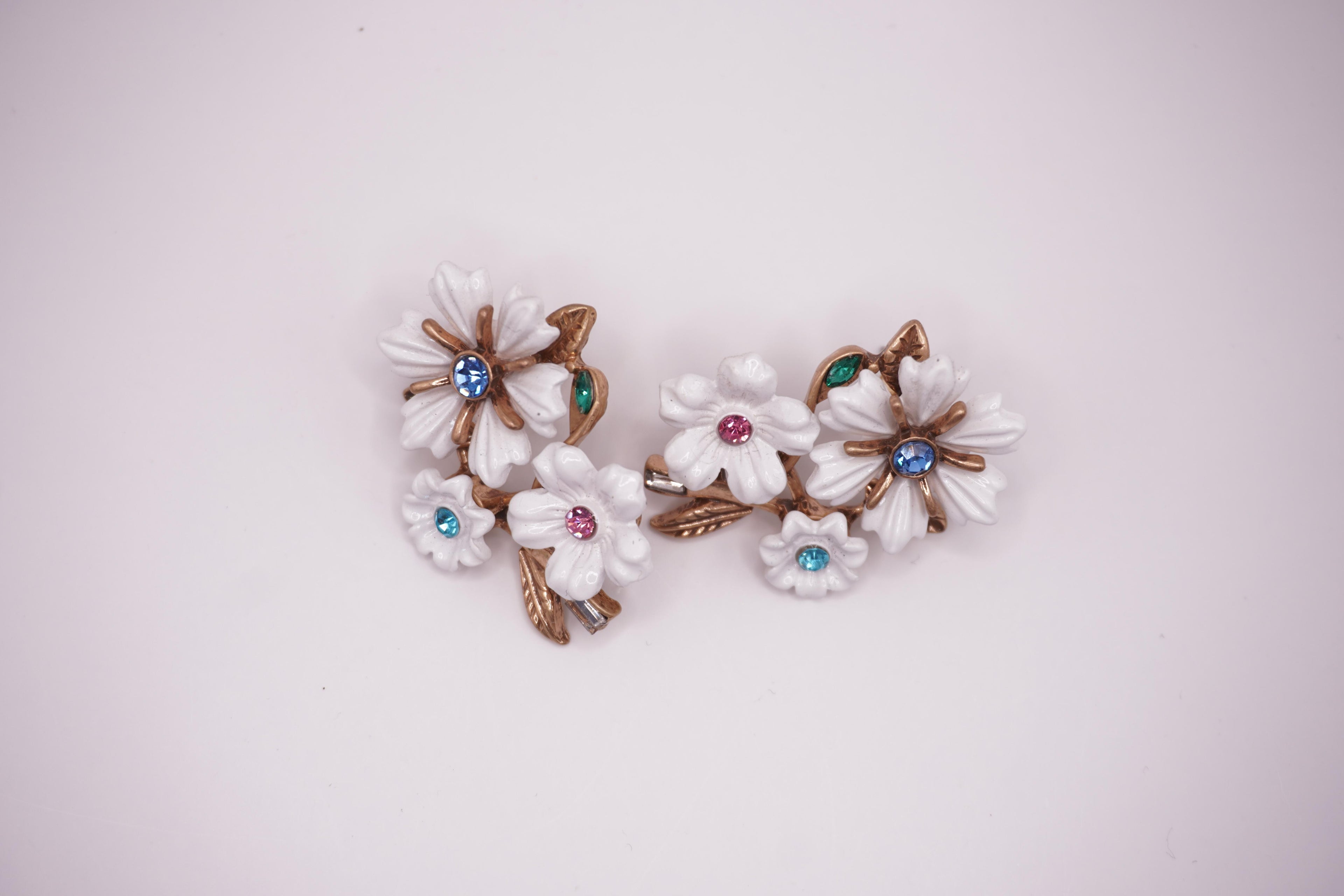 White enamel floral studs