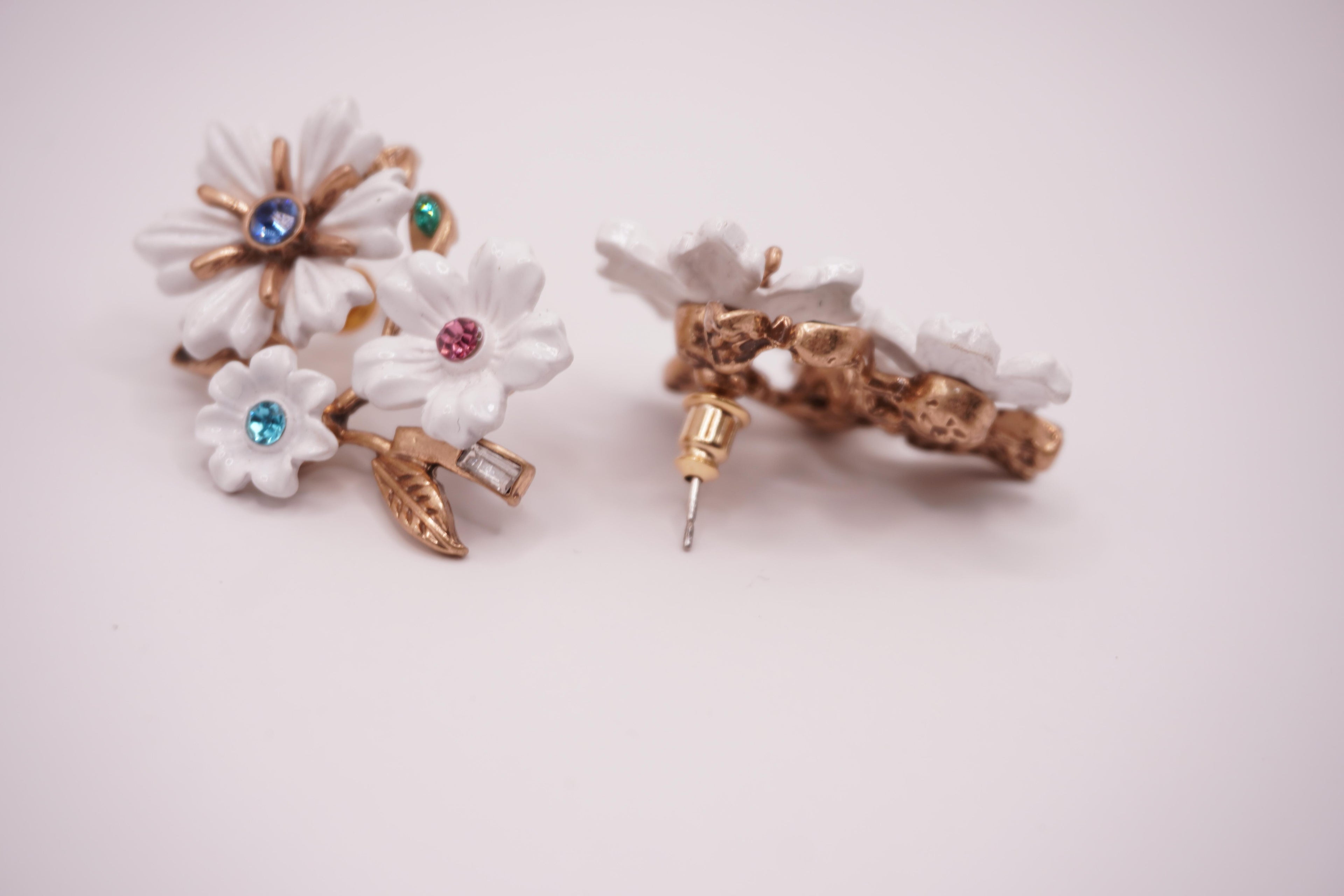 White enamel floral studs