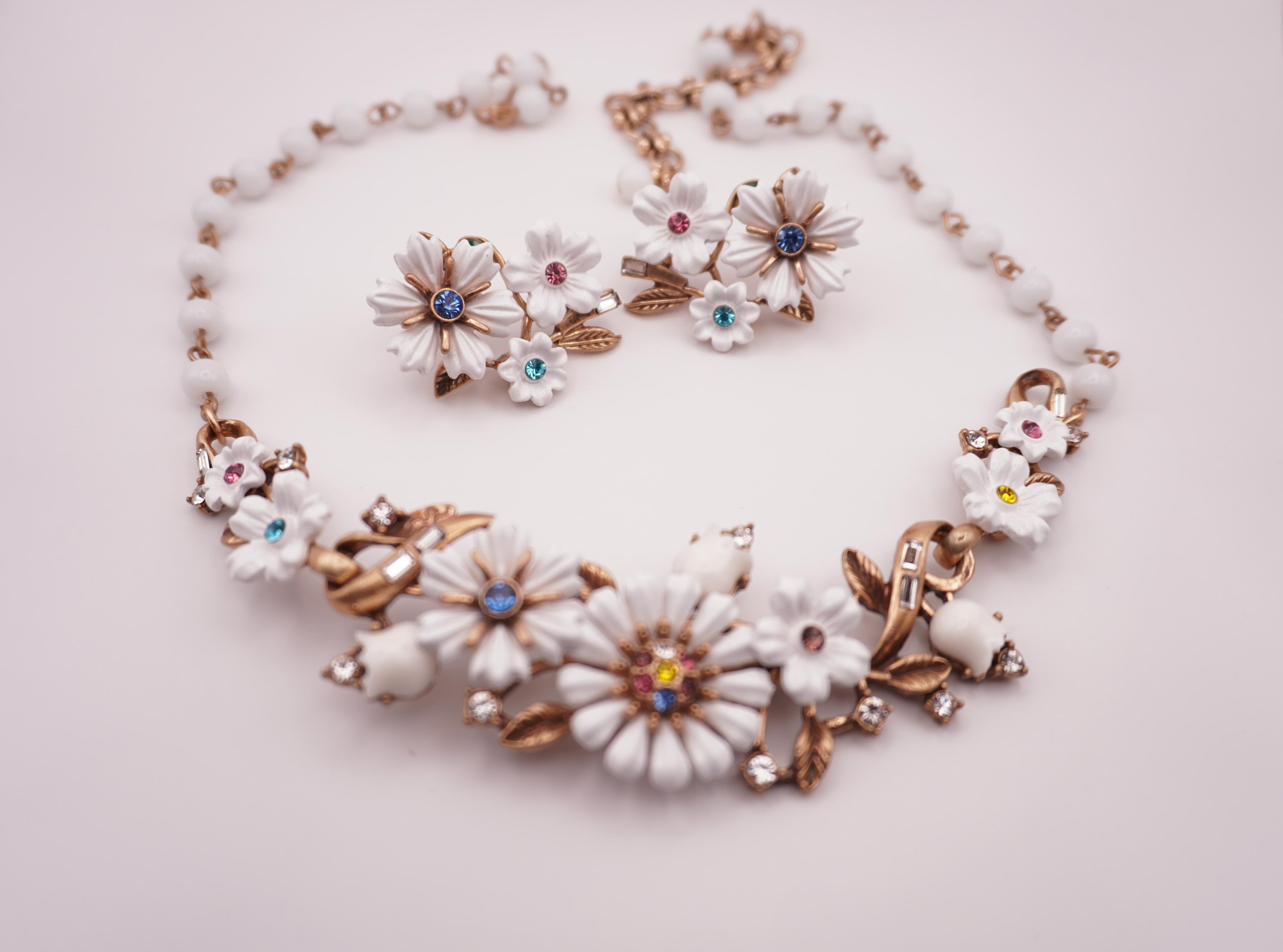 White enamel floral studs